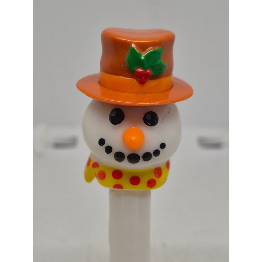 PEZ Snowman Candy Dispenser Orange Hat Yellow Scarf Made in Slovenia Holiday Toy